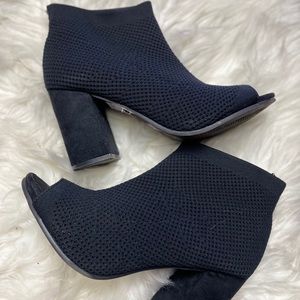 Black knit high heel boots